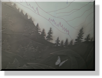 Mid Section shows true Carved Trees and Sloping Hills with Butterflies